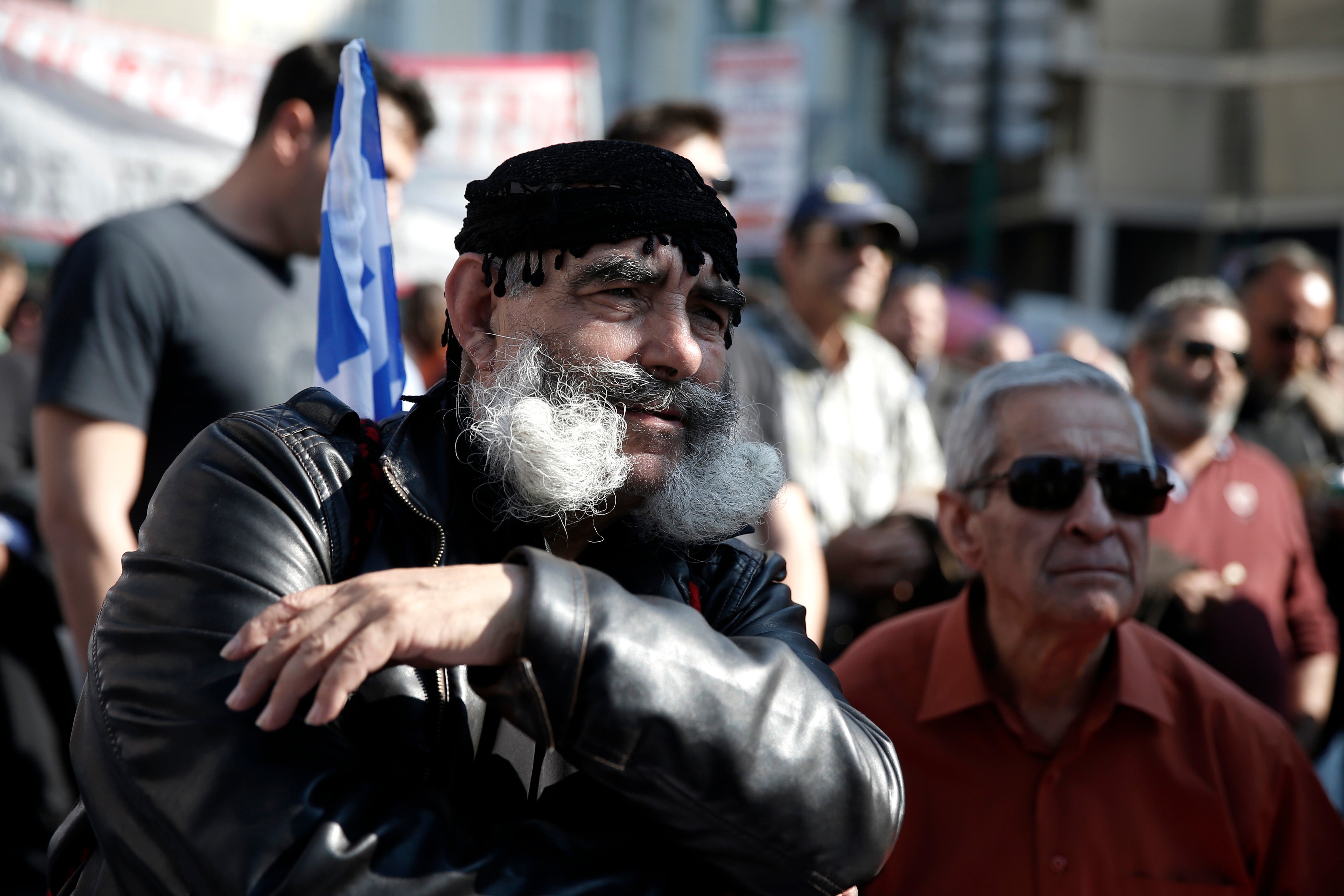 Greek farmers march to Parliament to protest planned reforms in their ...