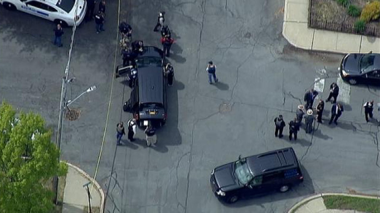 New York police officer shot, suspect found dead after barricade