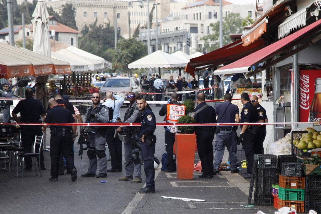 Police say Palestinian attacker stabs 2 in Jerusalem as violence ...