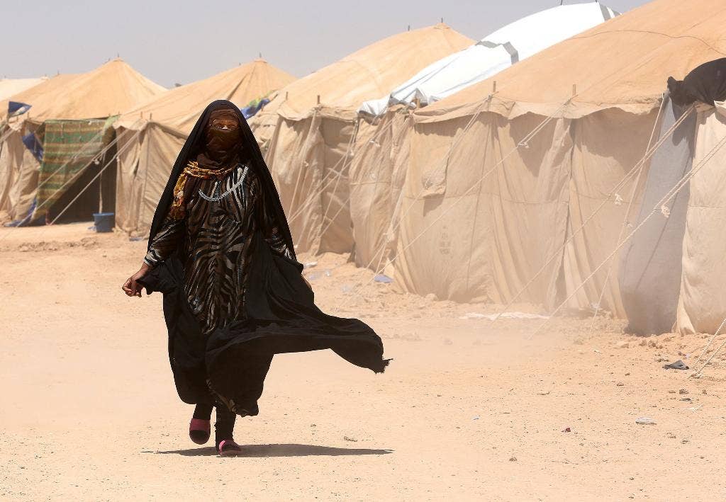 Irak menahan orang-orang yang melarikan diri dari Fallujah, yang telah meredakan ketegangan