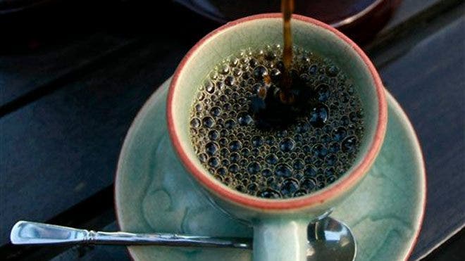 Coffee from an elephant's dung fills a $50 cup