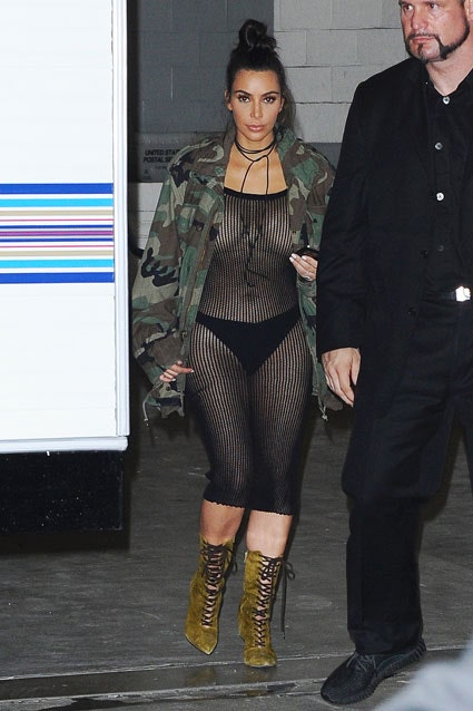 kim k in black mesh dress Kim Kardashian Honors the Virgin Mary in Skintight Sheer Dress