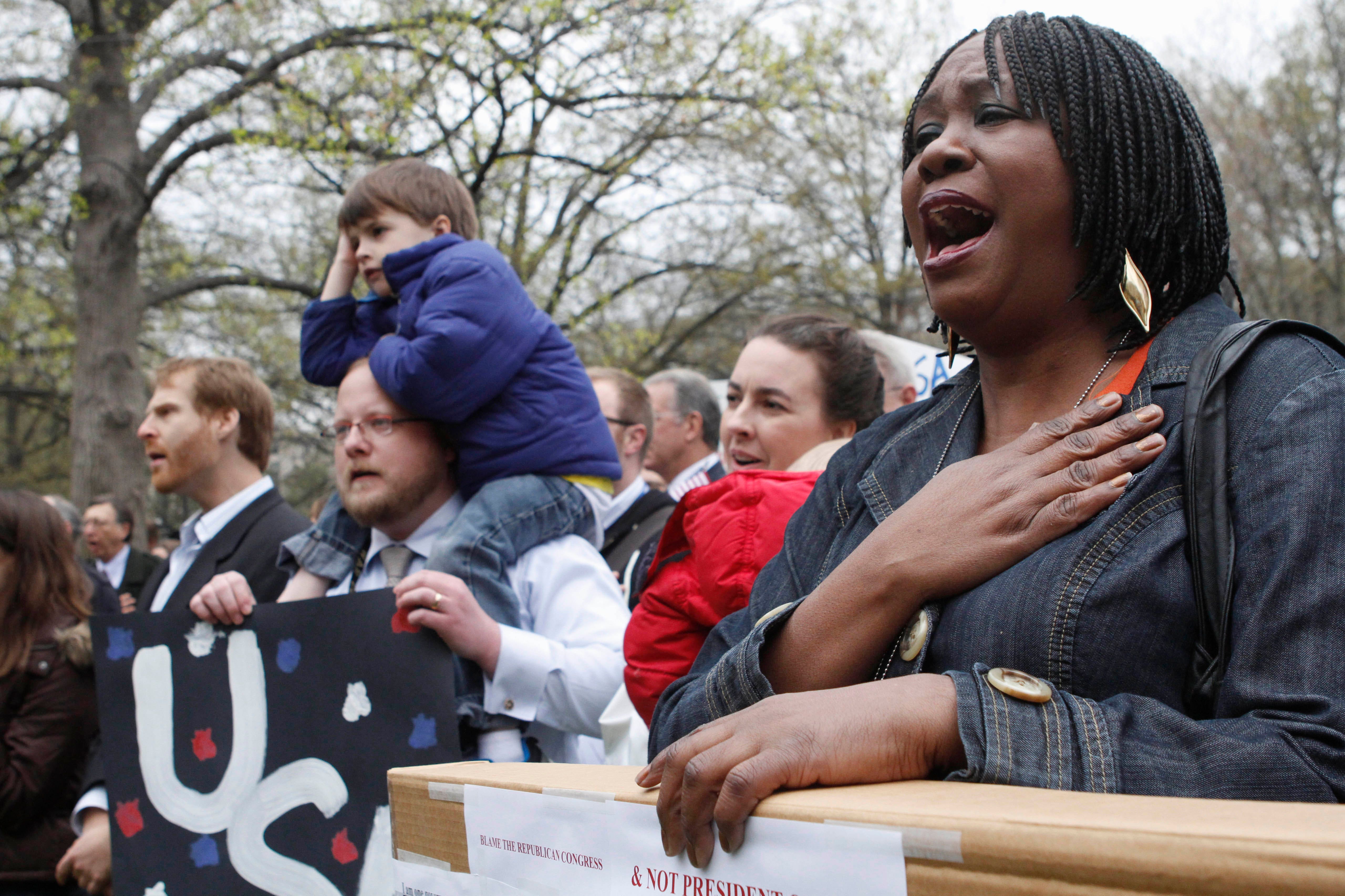 With Shutdown Near, Federal Workers Face Layoffs, Jobless Benefits