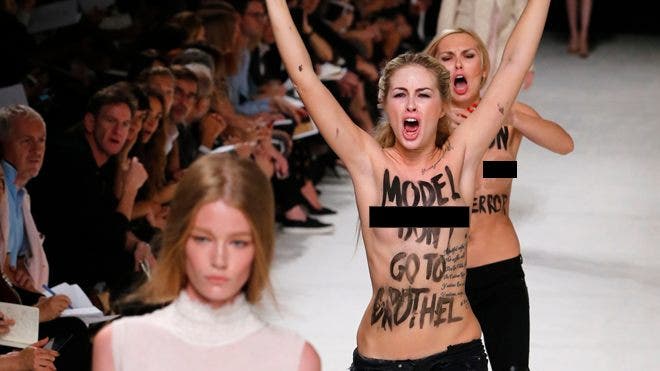 British supermodel punches topless female protester on catwalk Fox News