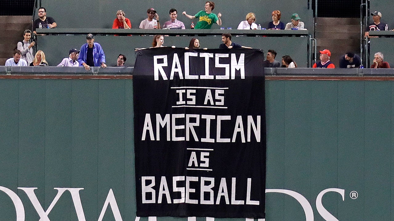 Red Sox Drape American Flag Over Green Monster, Play 'Taps' To Honor  Memorial Day - CBS Boston