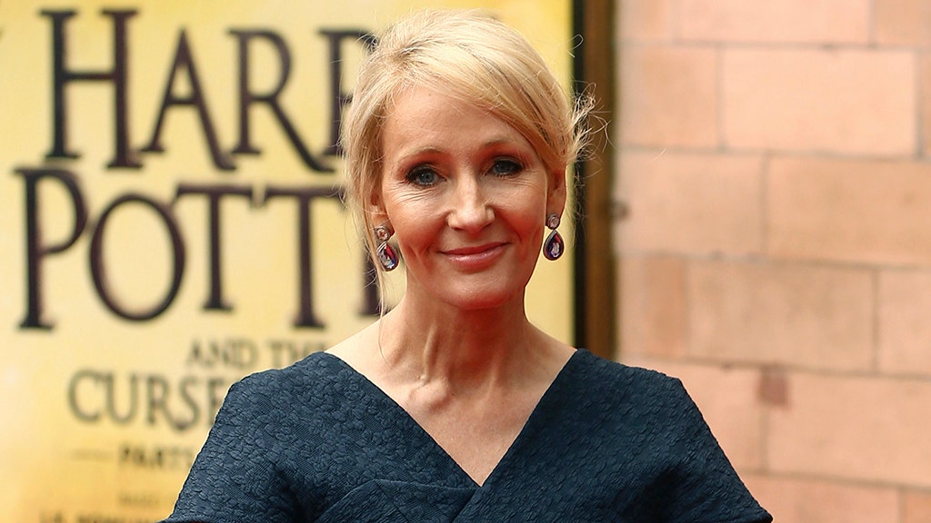 Author J.K. Rowling poses for photographers at a gala performance of the play Harry Potter and the Cursed Child parts One and Two, in London, Britain July 30, 2016. REUTERS/Neil Hall - LR1EC7U12Q3XU