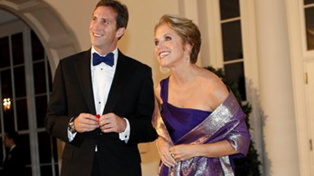 Nov. 24, 2009: Katie Couric arrives with Brooks L. Perlin for a State Dinner Hosted by President Barack Obama for Indian Prime Minister Manmohan Singh at the White House in Washington.