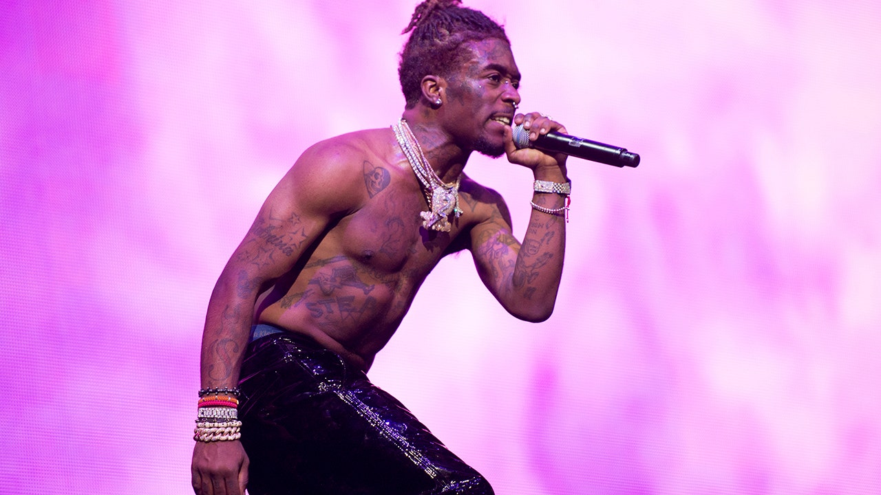 Lil Uzi Vert concertgoer throws Bible at the rapper during his