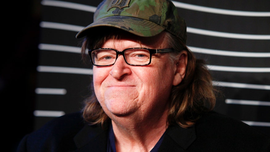 Michael Moore speaks out against Texans over Gov. Abbott's decision to reopen the state amid the coronavirus