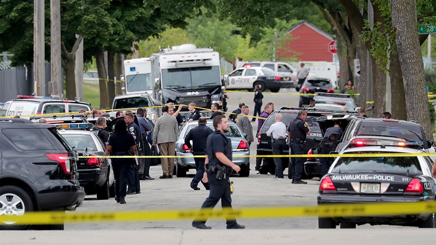 Milwaukee police officer shot dead after suspect allegedly yells 'I'm ...