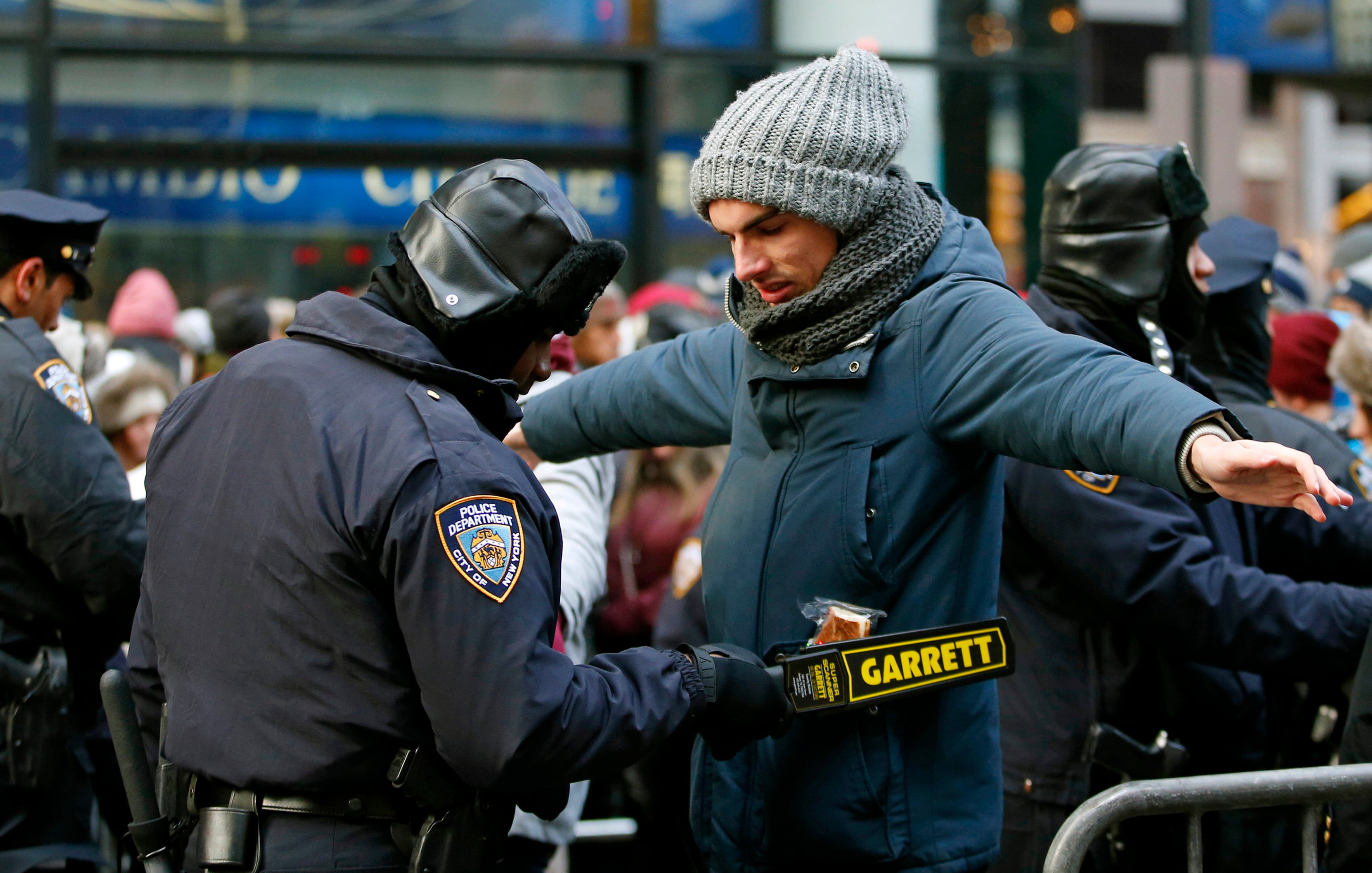 NYPD out in force to make New Year's Eve in Times Square 'safest place ...