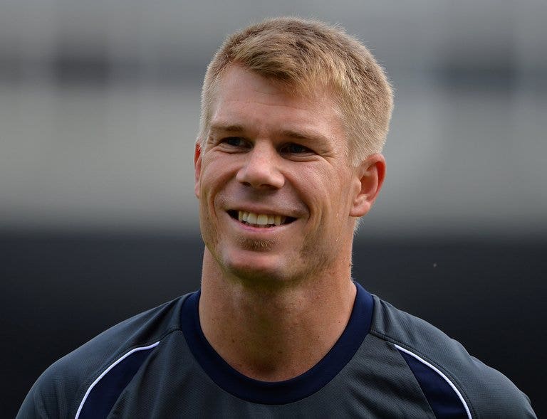 Clarke says Warner could feature in first Test