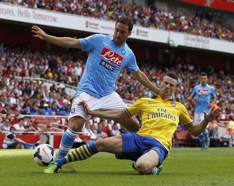 Koscielny membantu Arsenal bermain imbang dengan Napoli