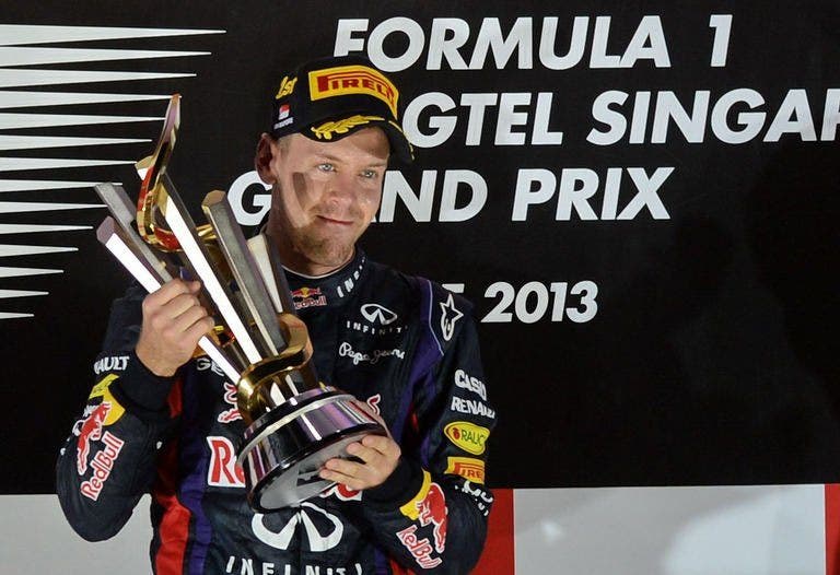Singapura tersengat saat Vettel menang lagi