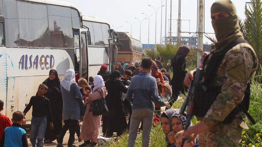 Syria car bomb: Death toll rises to 100 after explosion near evacuation buses