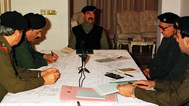 FILE - In this Jan. 14, 1999 file photo, Iraqi leader Saddam Hussein, center, meets with his top leaders in an undisclosed location. From left are: Gen. Ali Hassan Al Majd, Commander of the southern region, Iraqi Vice President Taha Yassin Ramadan, Hussein, Deputy Prime Minister Tariq Aziz, and Abd Hmoud, secretary to Saddam Hussein. Iraq's Justice Ministry said Thursday, June 7, 2012 that a close aide to Saddam Hussein has been executed.