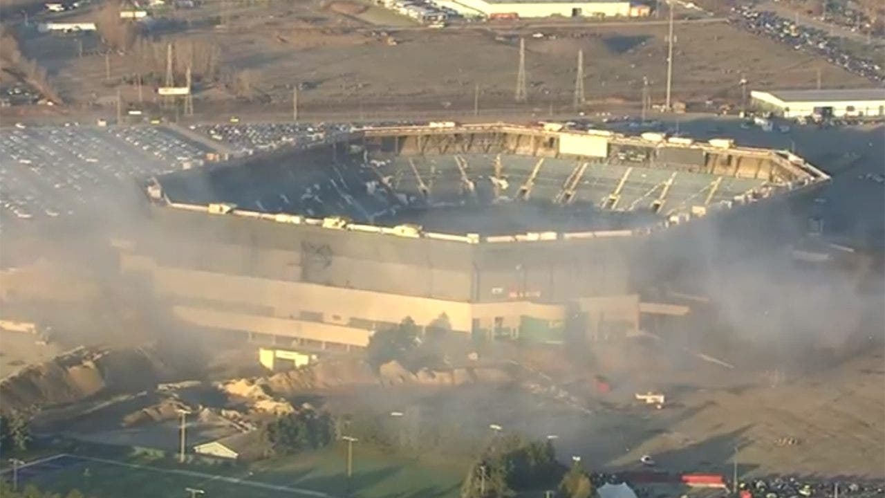 Detroit Lions old stadium the Pontiac Silverdome stands crumbling having  been abandoned years ago and left to rot in eerie pictures