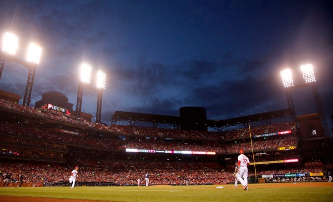 Woman reportedly hit by stray bullet while attending Cardinals game at ...