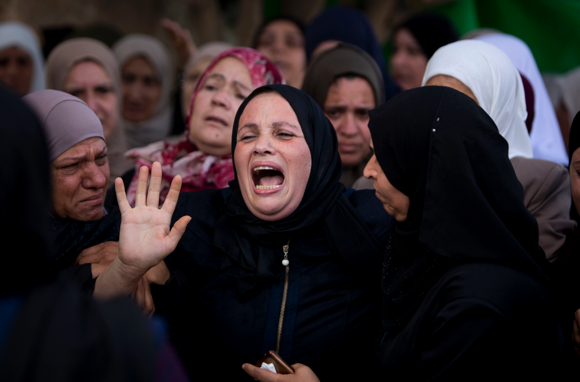 Palestinians bury woman killed in West Bank, 7 slain in Gaza | Fox News