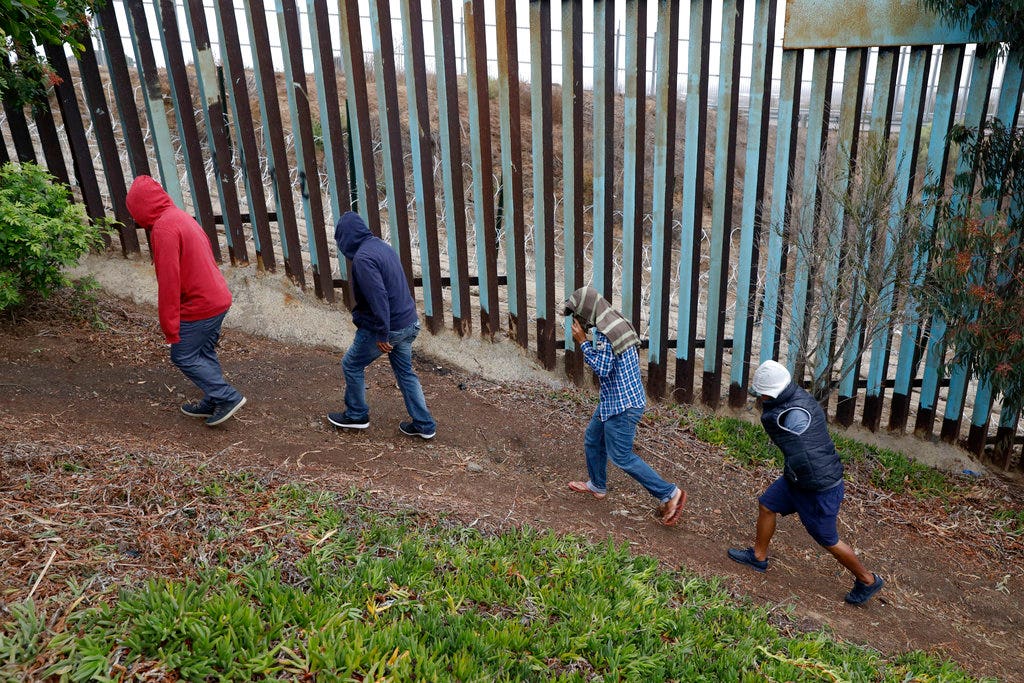 Honduran, woman, 19, in migrant caravan scales border wall to give birth in US after 2,000-mile trip