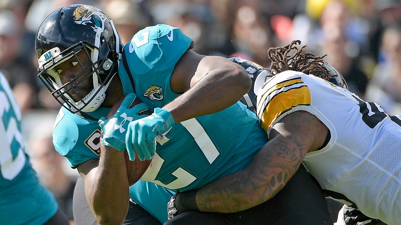 Jacksonville Jaguars running back Leonard Fournette, left, is