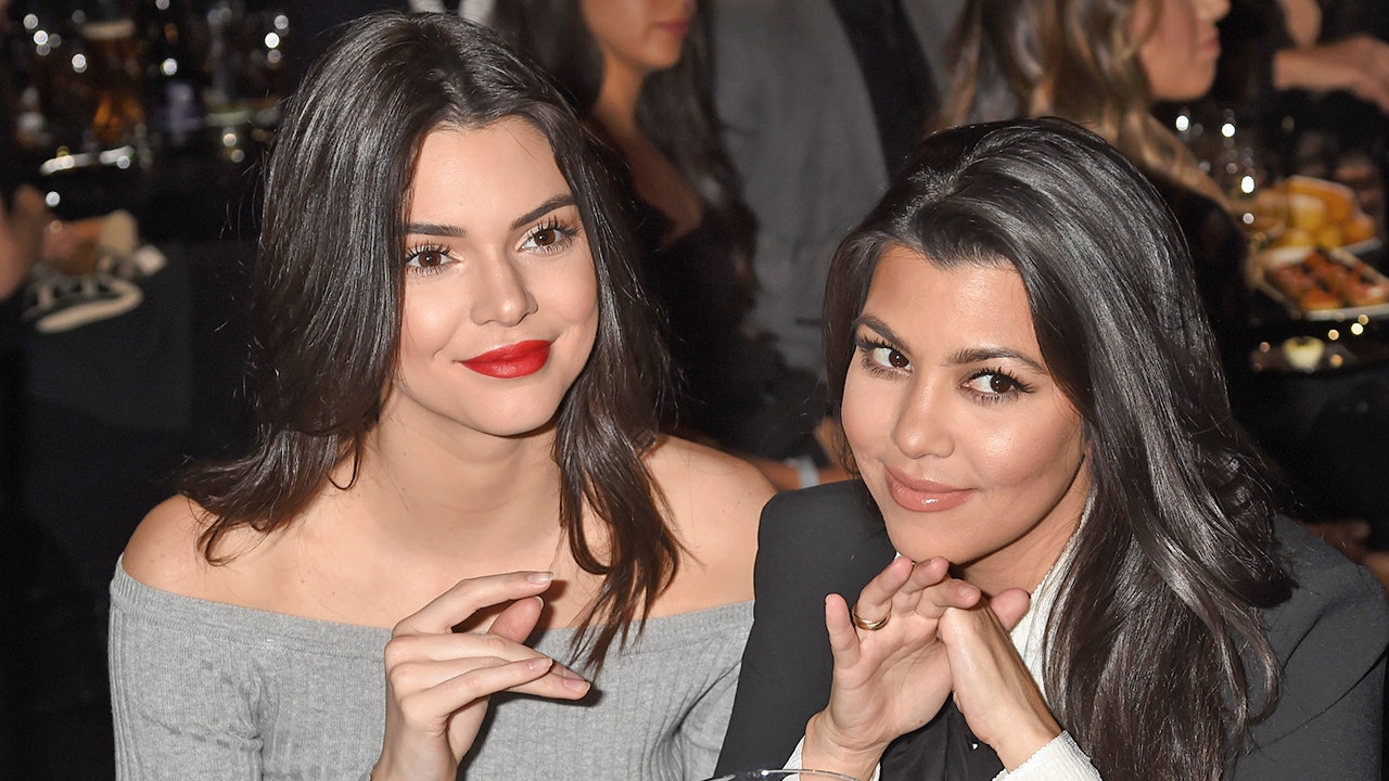 Kourtney Kardashian and Kendall Jenner squeak in the cheeky bikini photo