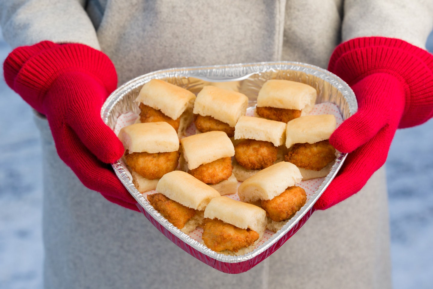 Chick-fil-A serving chicken in heart-shaped trays for Valentine's Day.