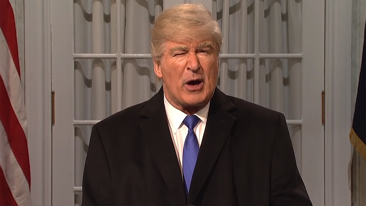 Alec Baldwin poses as Trump in a mask to promote 'SNL' premiere amid