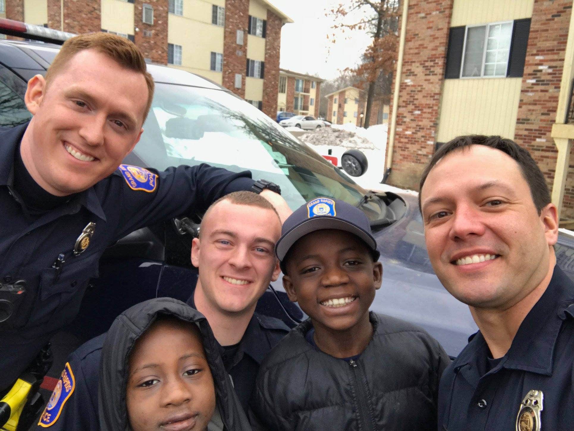 Michigan police officers drive 9-year-old boy to school, surprise him ...