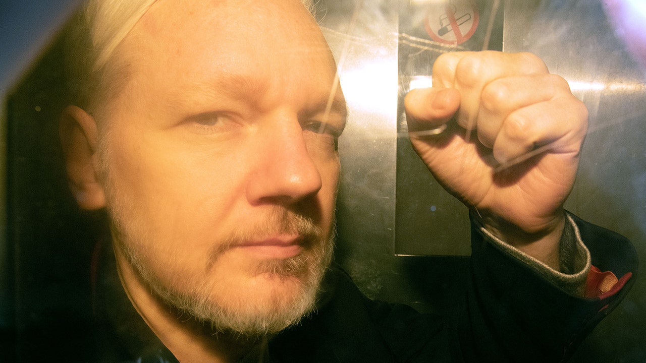 Julian Assange sentenced to 50 weeks in prison, day before facing extradition hearing