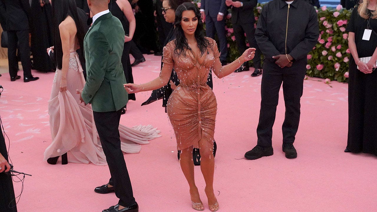 Kim Kardashian West got pee 'all over' herself in glitzy gowns - 8days