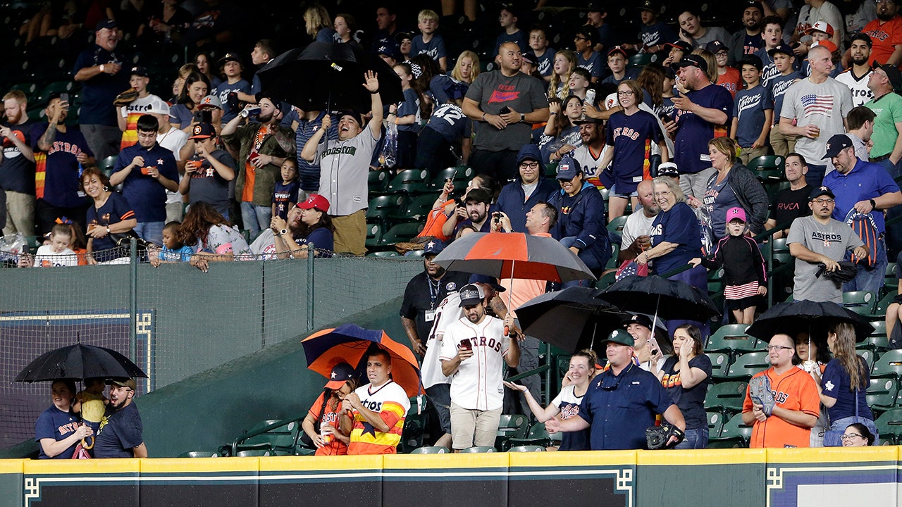 When Minute Maid Park's roof opens, some Astros fans enjoy the air
