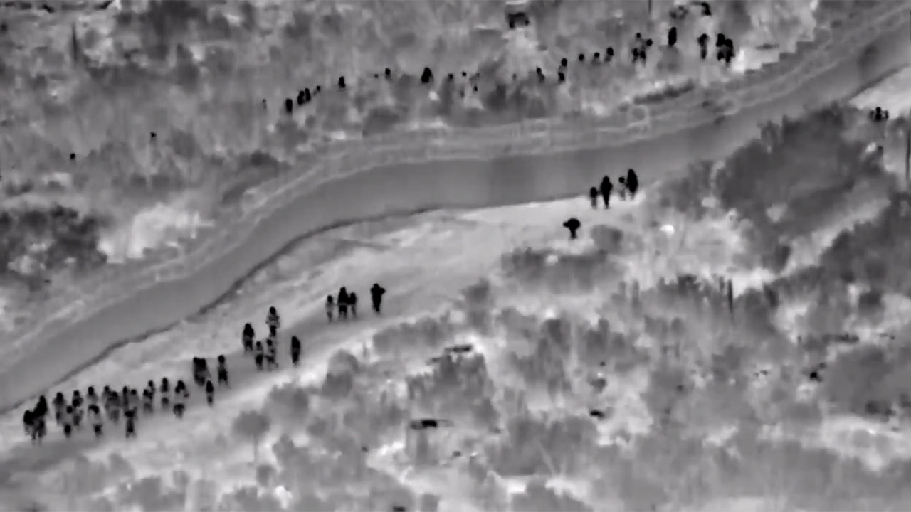 Footage shows migrants walking around border wall to enter US | Fox News