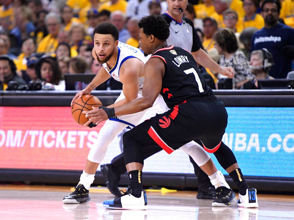 Kyle Lowry shoved by fan after landing out of bounds in Game 3 of