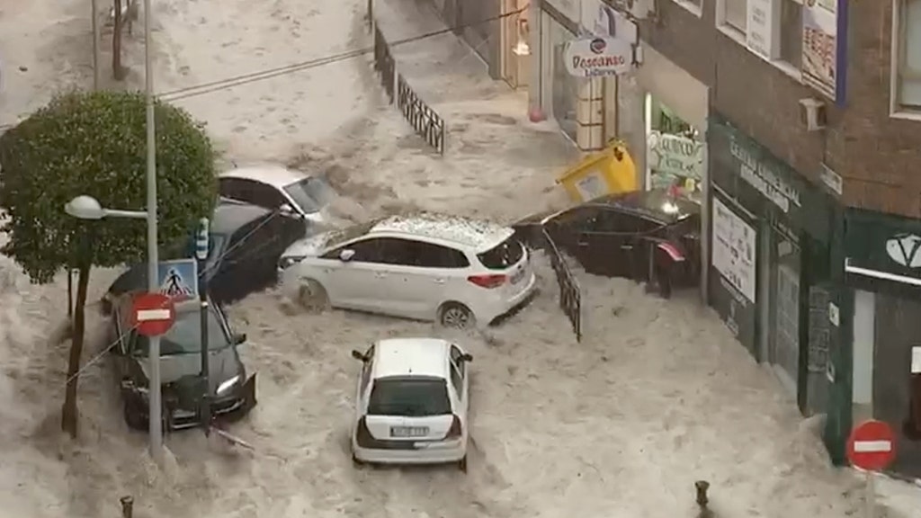 Madrid area inundated by severe rain, hail storm that spawned dramatic