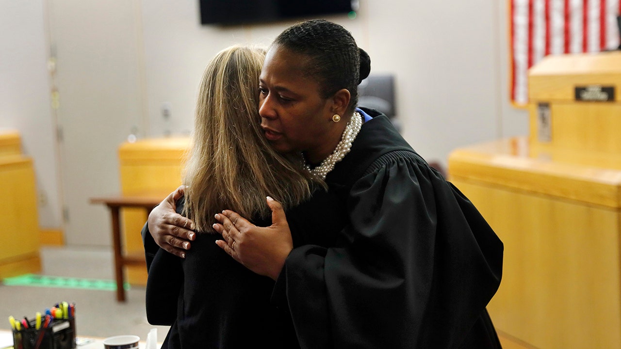 Judge hugs Amber Guyger, gives her a Bible after murder conviction, causing stir