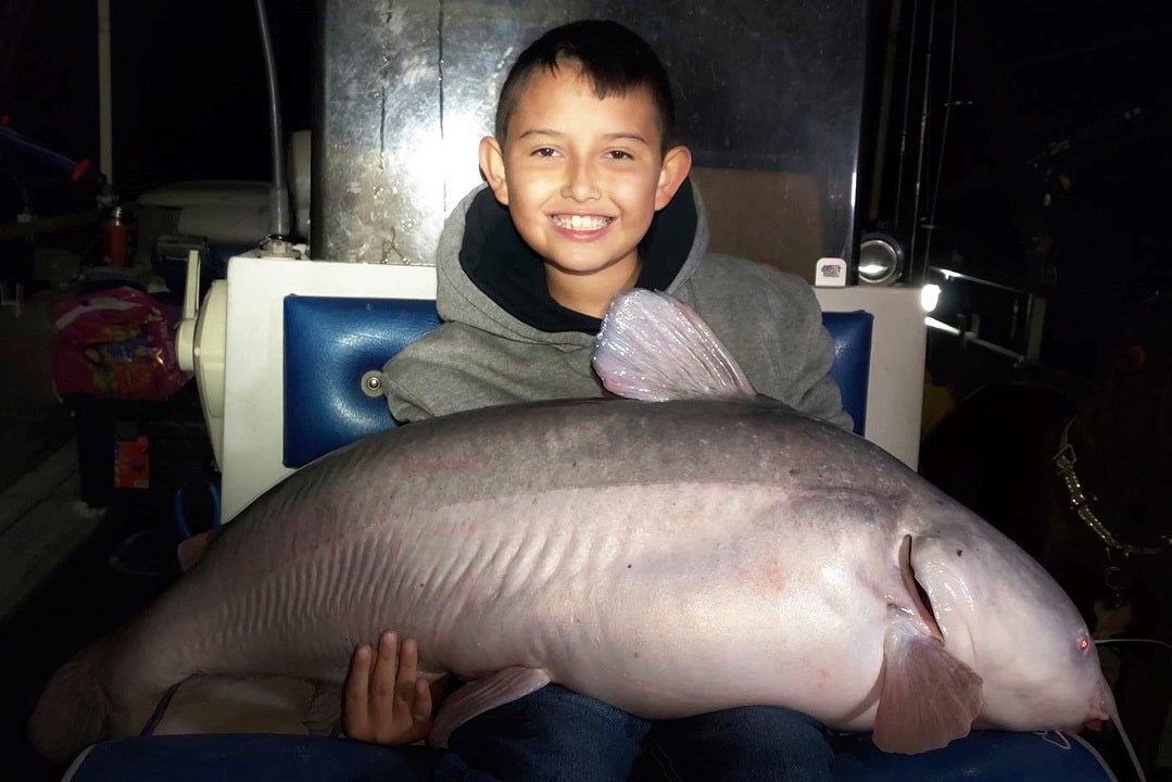 Two Men & Boy,Shore of Lake McMillan,New Mexico,NM,Catfish,Carp