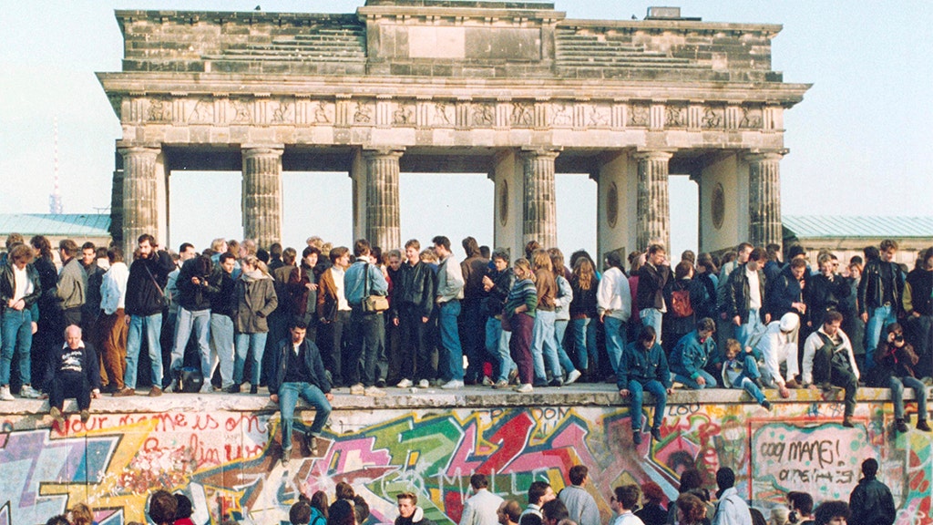 On this day in history, November 9, 1989, Berlin Wall falls, marking Cold War victory by US, western Allies