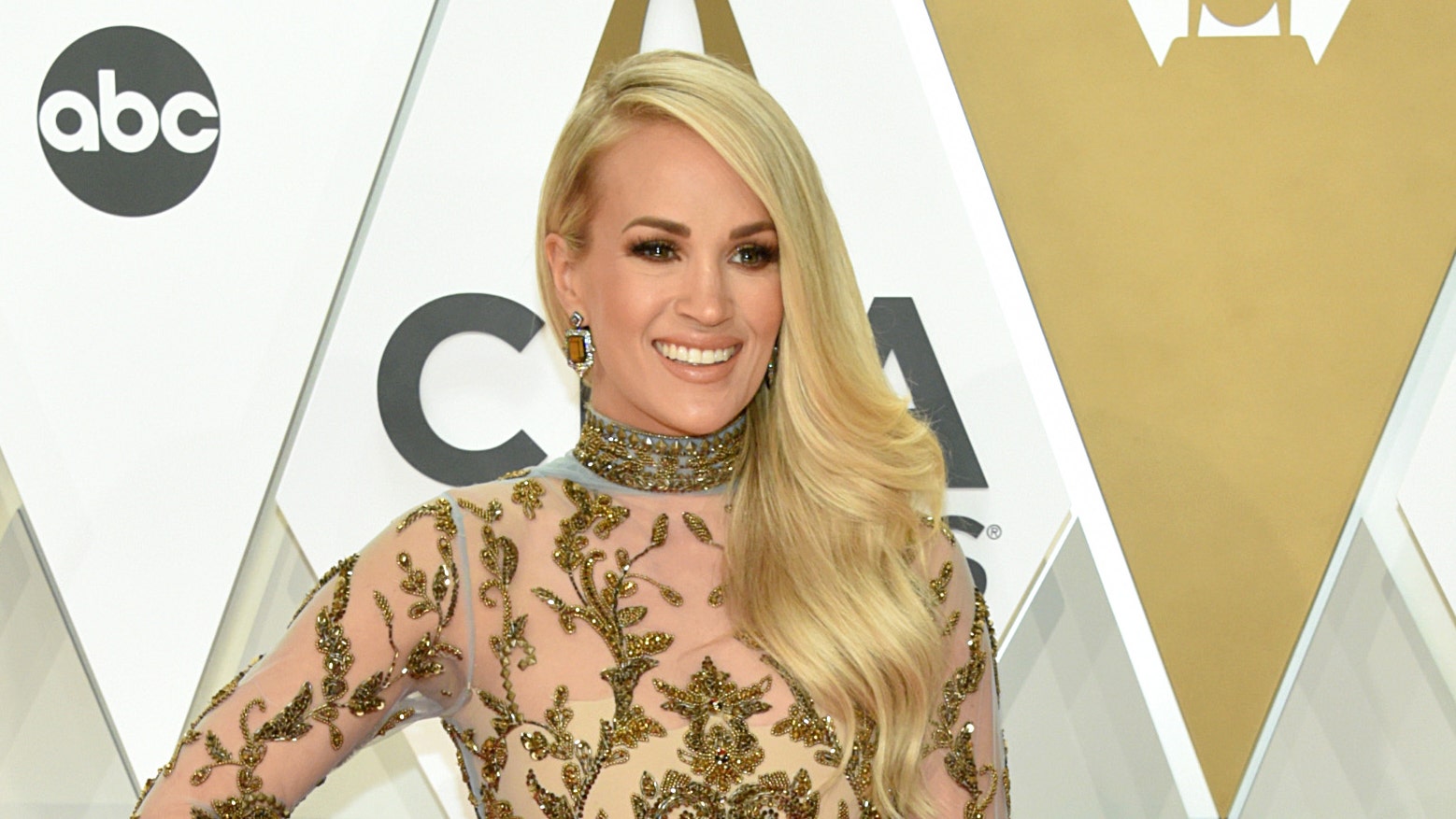 Carrie Underwood Flashes Legs In Two Short Dresses At The Grammys