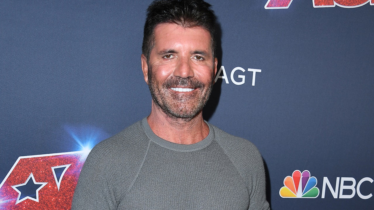 Simon Cowell all smiles one day after latest e-bike accident
