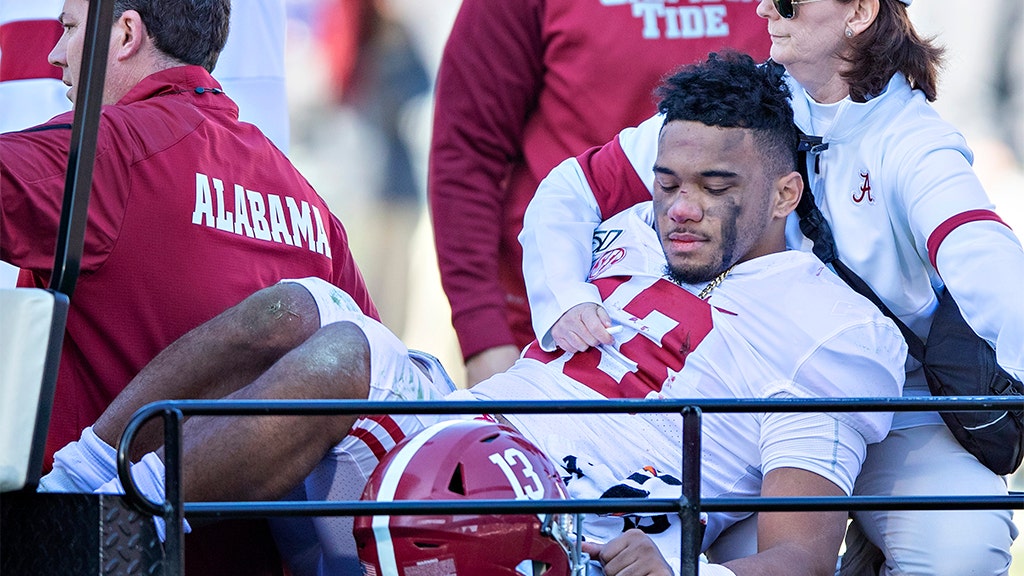 Alabama's Tua Tagovailoa carted off field 'screaming in pain'