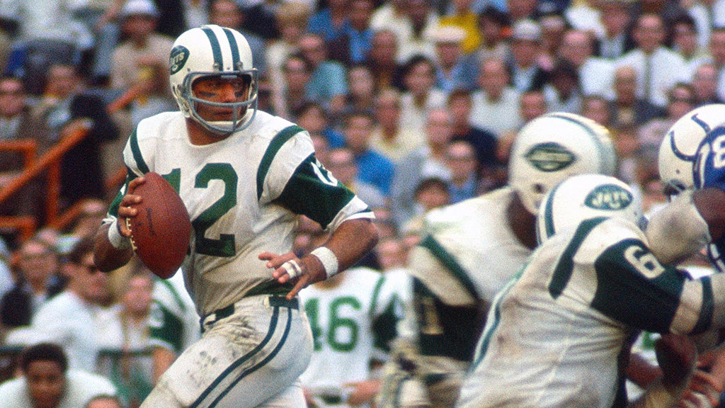 Joe Namath of the New York Jets drops back to pass against the