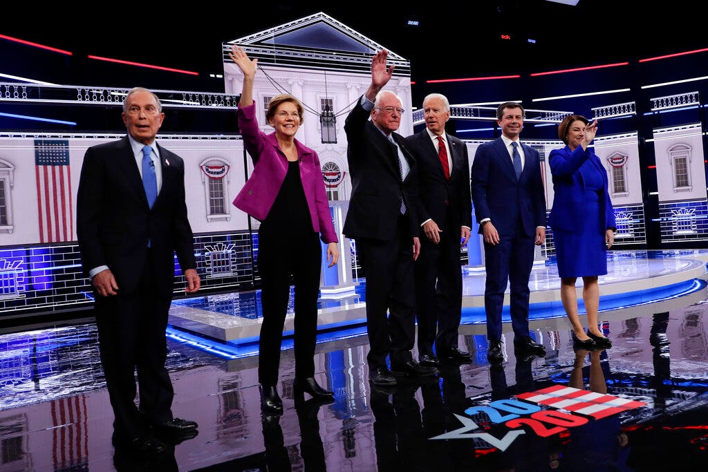 Bloomberg under siege at chaotic debate debut, as Warren attacks field ...