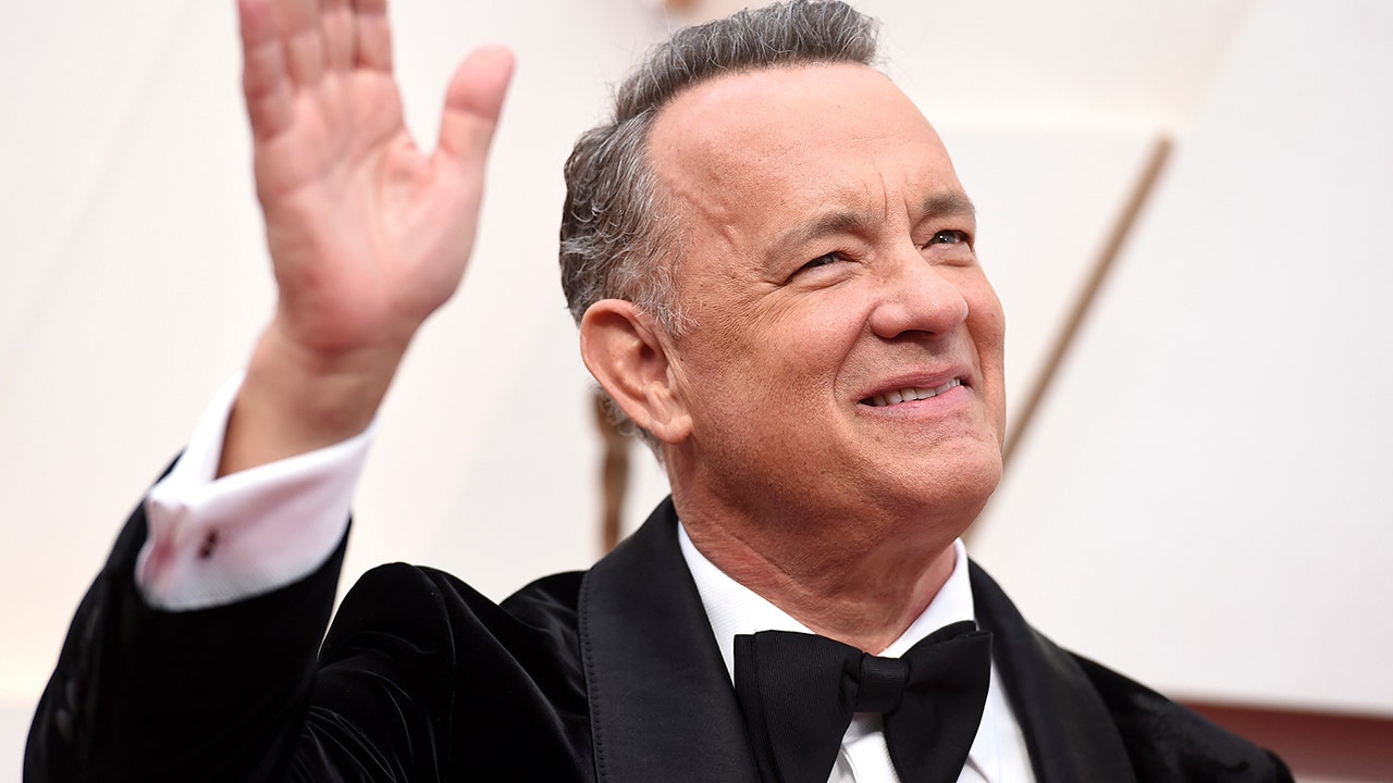 Tom Hanks shares why he loves crashing wedding photos: ‘It’s my ego unchecked’