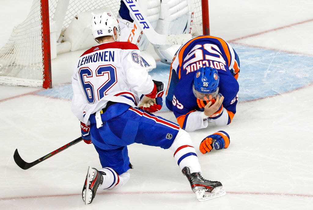 Islanders defenseman Johnny Boychuk takes skate to the face