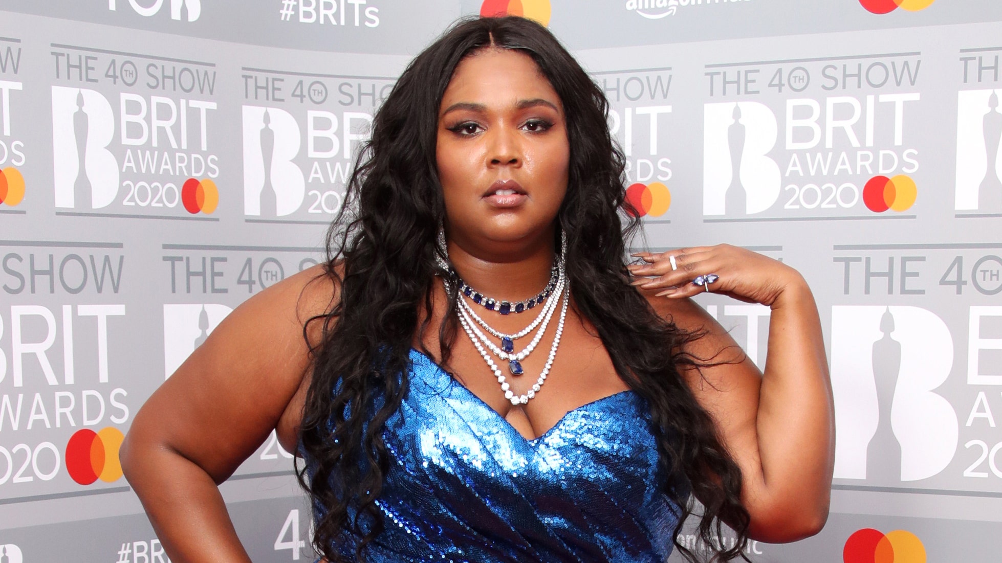 Lizzo Stuns In Gold Dress In Honor Of Plus Size Appreciation Day We