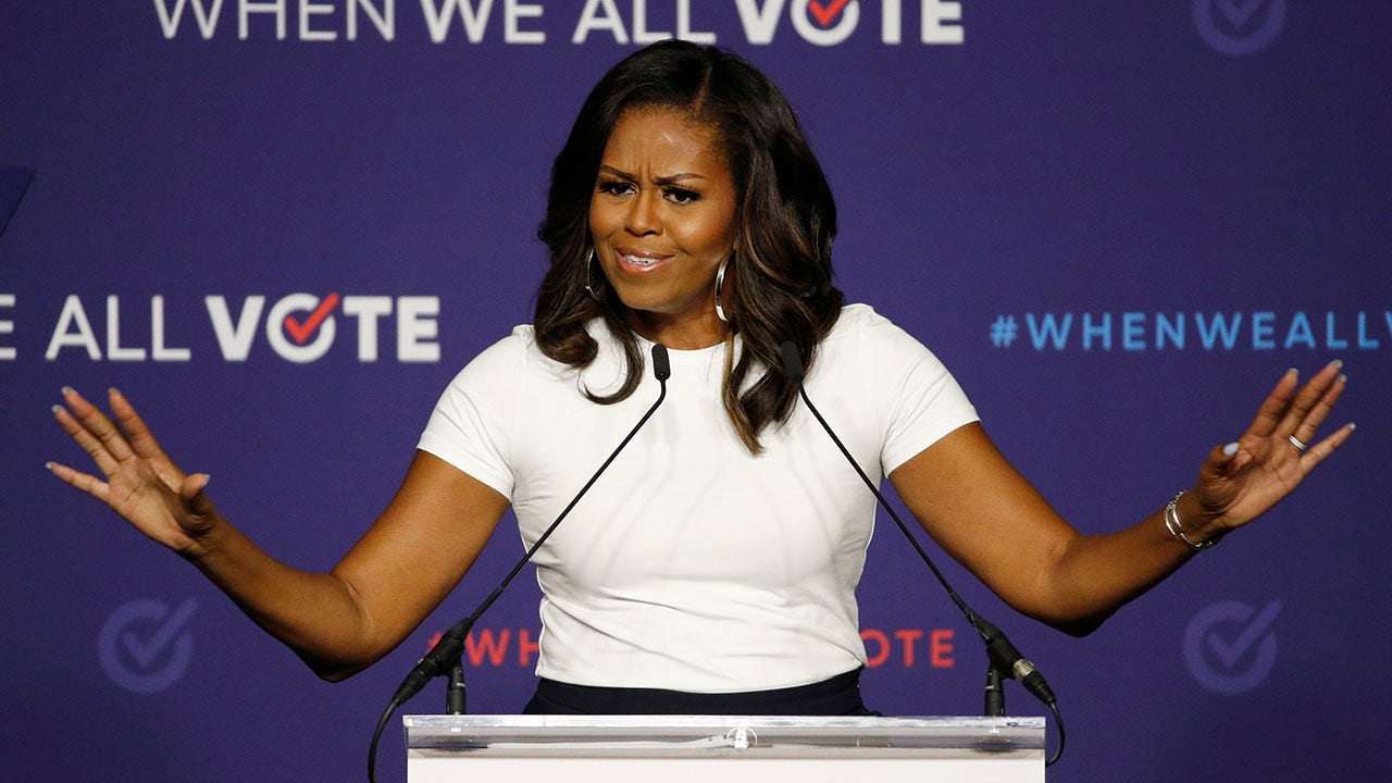 Michelle Obama warns that 'our democracy remains under attack' by state officials