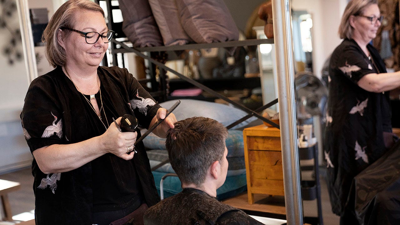 Danes rush for haircuts after government takes new steps in easing ...