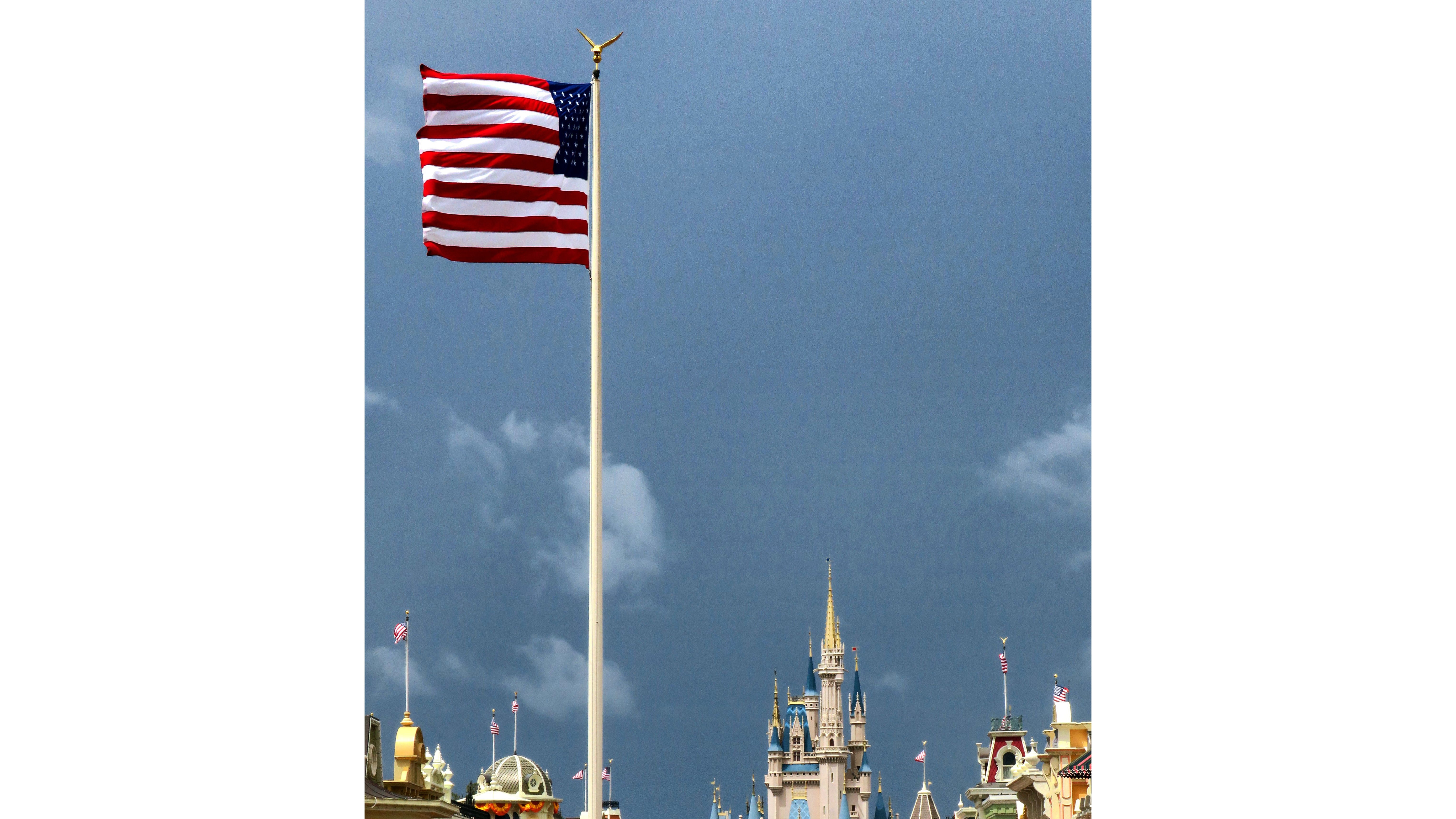 Disney World continues to raise, fly US flag despite park closure: 'It