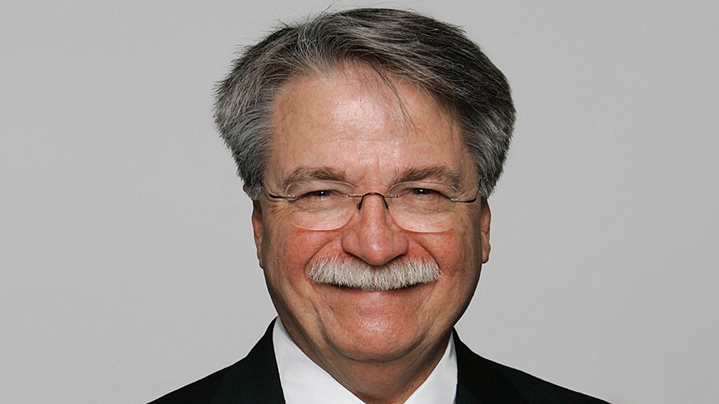 The Tennessee Titans president announced his retirement after 40 years —  and people couldn't stop talking about his facial hair